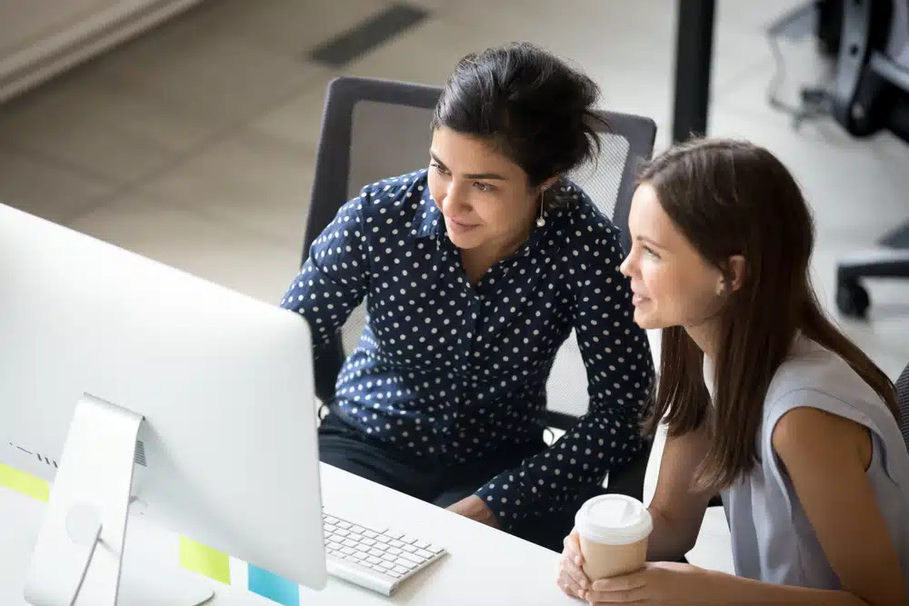 Multiracial,Colleagues,Indian,And,Caucasian,Young,Women,Having,Coffee,Break Multiracial,Colleagues,Indian,And,Caucasian,Young,Women,Having,Coffee,Break