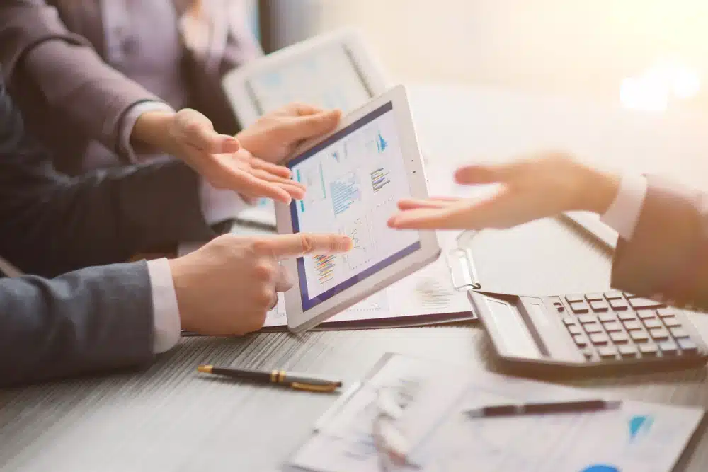 Close,Up.,Business,Colleagues,Discussing,Financial,Documents. finance jobs