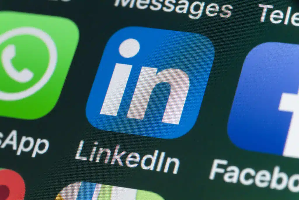 LinkedIn, Facebook, Snapchat and other phone Apps on iPhone screen linkedIn
